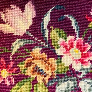 Beautiful vintage finished embroidery on burgundy wool, in fanciful floral’s